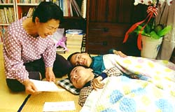 20년 누워서 생활·공부…마침내 고입검정 수석·3등 불치의 장애 극복 장욱, 훈 형제